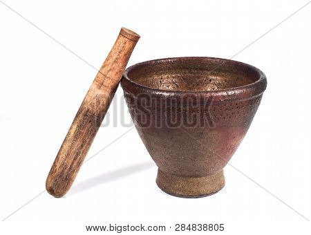 Red Clay Mortar Kitchen Tool On White.
