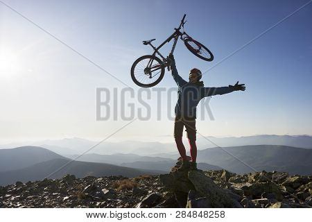 Alpine Landscape With A Biker