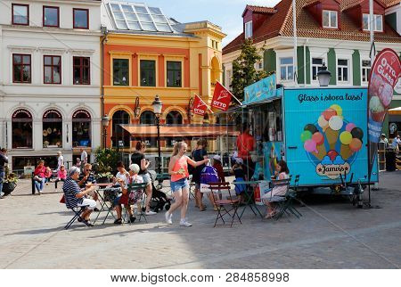 Ystad, Sweden - June 26, 2018: People Visiting An Mobile Ice Cream Kiosk Selling The Ottoglass Brand