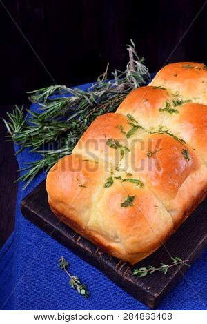 Golden pampushki with herbs and garlic. Ukrainian cuisine buns