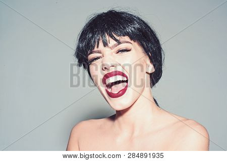 Woman With Attractive Red Lips Looks At Camera. Girl On Scandalous Shouting Face Posing With Naked S