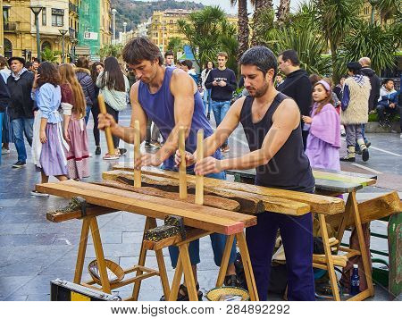 Musician Playing The Txalaparta, A Traditional Instrument Of The Basque Country. Spain.