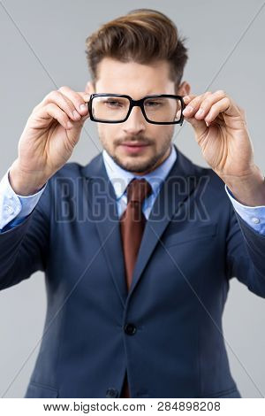 Elegant Man Wear Dark Siut And Glasses