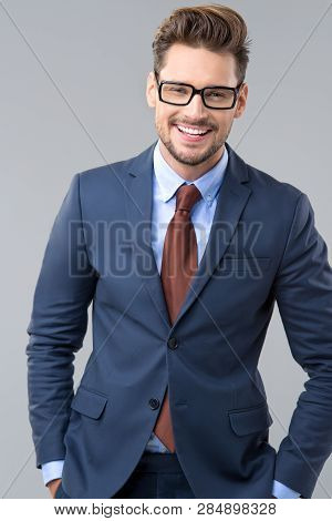 Elegant Man Wear Dark Siut And Glasses