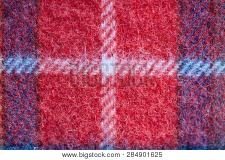 Close Up Of Traditional Scottish Woolen Tartan Fabric