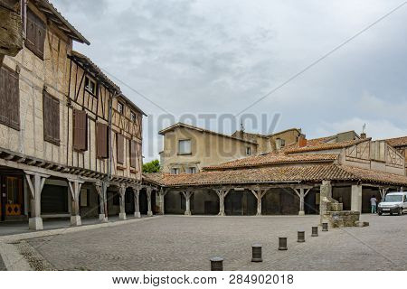 Lautrec , Tarn, France; June 2015: View Of Main Square Of Medieval Village With Half-timbered Buildi