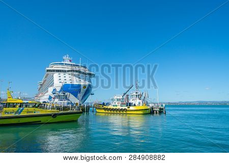 Mount Maunganui New Zealand - February 10 2019:  Port Of Tauranga Two Pilot Boats And Large Cruise L