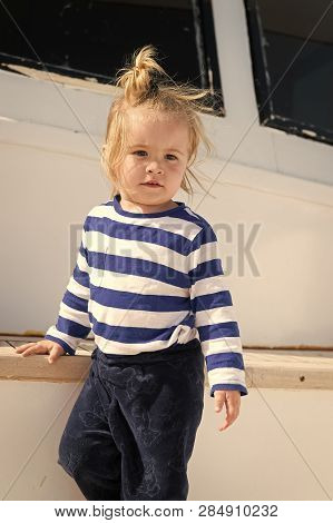 Kids Fashion On Vacation. Boy Adorable Sailor Striped Shirt Yacht Travel Around World. Baby Boy Enjo