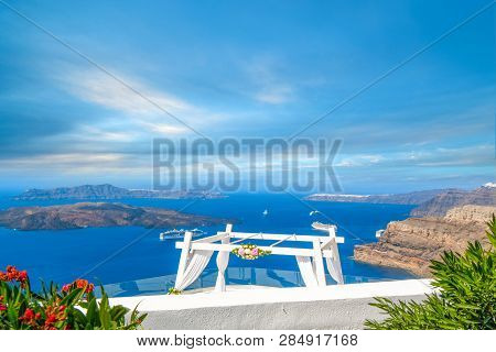 View Of The Aegean Sea, Cruise Ships, And The Santorini Caldera From A Mountaintop Wedding Venue In 