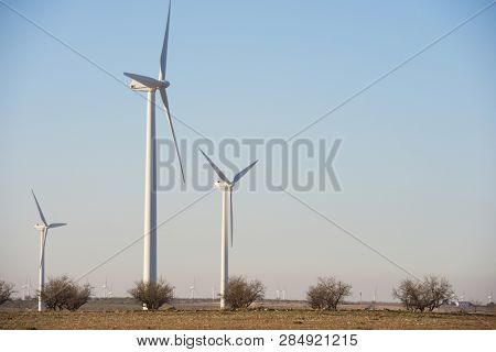 Windmilsl for electric power production, La Muela, Zaragoza Province, Aragon, Spain.