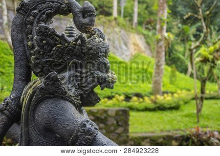 Stone Statue Inside The Gunung Kawi Sebatu Temple, Ubud, Bali, Indonesia. The Temple Complex Is Loca