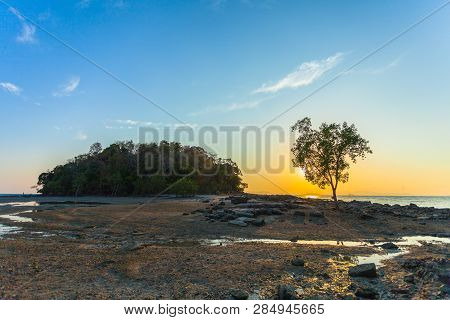 Sunset At Kwang Island. Kwang Island Is In The Middle Of Kwang Beach Krabi Thailand.when Low Tide Ca