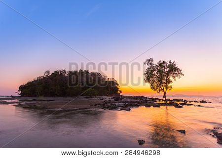 Sunset At Kwang Island. Kwang Island Is In The Middle Of Kwang Beach Krabi Thailand.when Low Tide Ca
