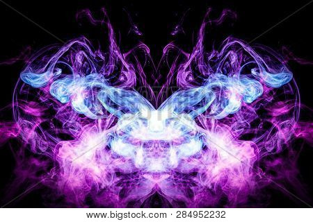 Thick Colorful Smoke Of Blue, Pink In The Form Of A Skull, Monster, Dragon On A Black Isolated Backg