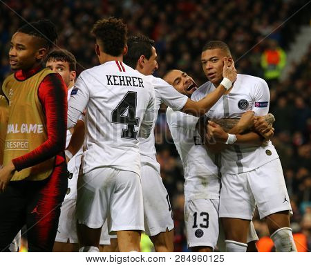 MANCHESTER, ENGLAND - FEBRUARY 12 2019: Kylian Mbappe of PSG celebrates scoring a goal during the Champions League match between Manchester United and Paris Saint-Germain at Old Trafford Stadium.