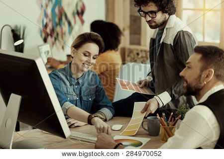 Friendly Trade Marketing Team Discussing New Project