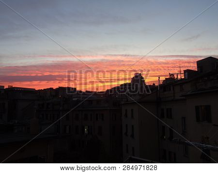 Genova, Italy - 02/12/2019: An Amazing Caption Of The Sunset Over The City Of Genoa In Winter Days C