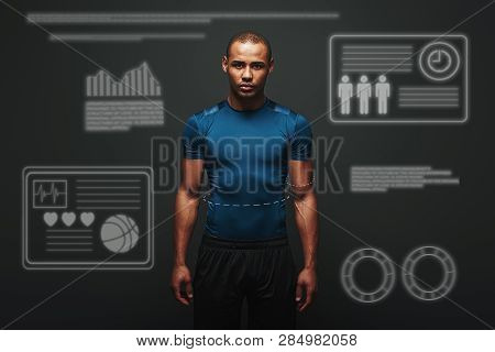 The Only Bad Workout Is The One That Didnt Happen. Handsome Sportsman Standing Over Dark Background.