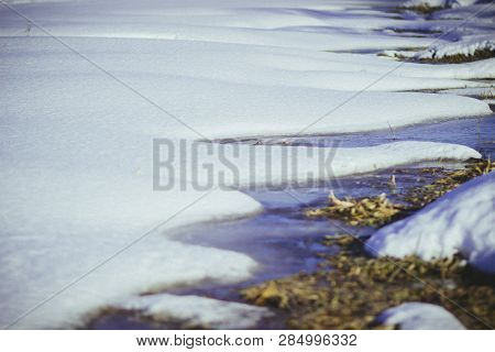 White Snow On A Small River In Russia In Winter