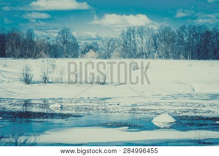 White Snow On A Small River In Russia In Winter