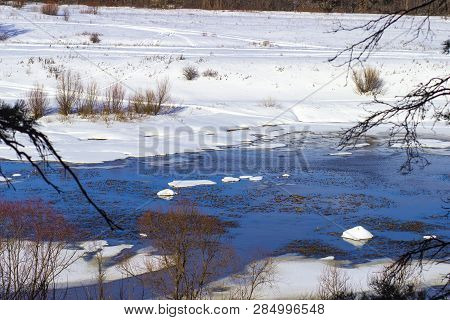 White Snow On A Small River In Russia In Winter