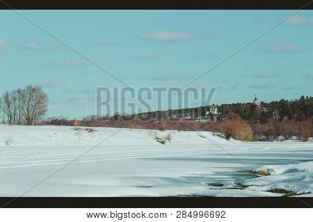 White Snow On A Small River In Russia In Winter