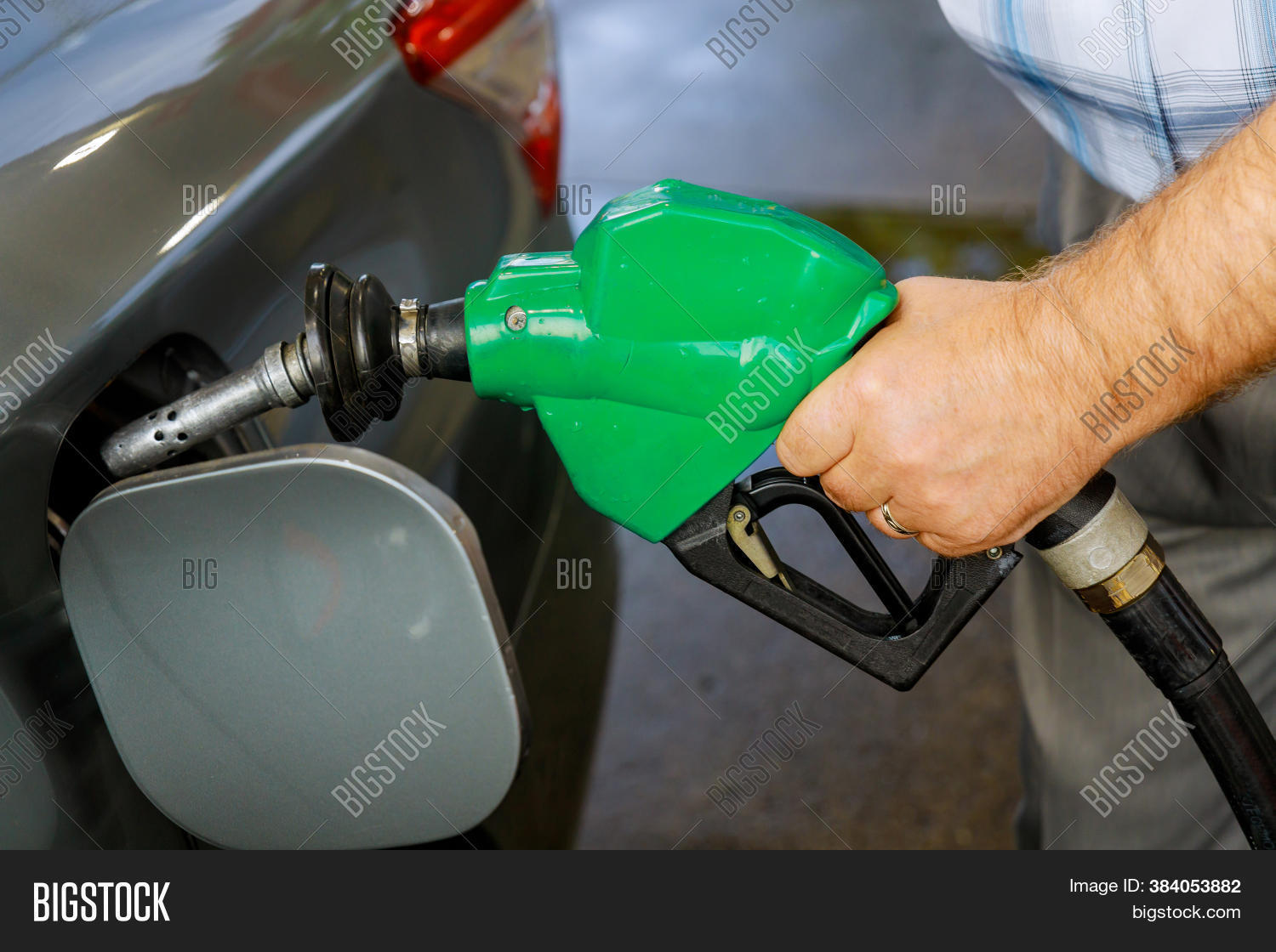 Man Pumping Gasoline Image & Photo (Free Trial) Bigstock