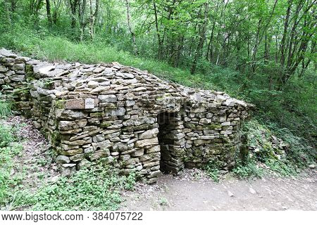 Old And Typical Stone Hut Called Caborne In French Language In Saint Cyr Au Mont D'or, France