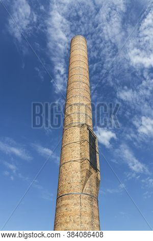 Toledo - Circa September 2020: Overland Smokestack In The Overland Industrial Park, The Final Remain