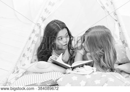 Imagination Ran Away With Them. Little Girls Read And Imagine During Bedtime. Cute Dreamers With Boo