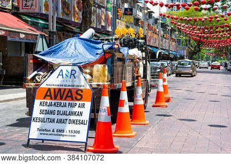 Jalan Alor Food Street In Kuala Lumpur. The Utility Vehicle Truck Displayed Warning Signs. Kuala Lum