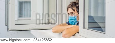 Banner, Long Format Extremly Tired Young Man Looking Out The Window, Home Alone. Self-isolation At H