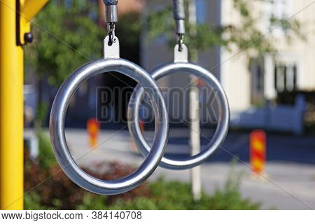 Metal Rings To Climb In At Outdoor Gym