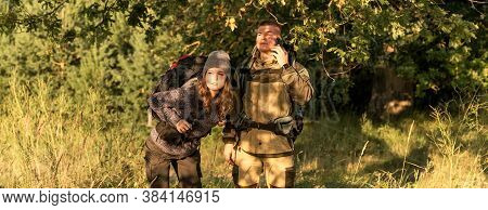 A Young Woman And A Young Man Walk In The Park, .