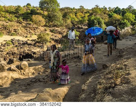 Tis Issat, Ethiopia - Feb 05, 2020: Ethiopian People Near The Bridge Of The Portuguese On The River 