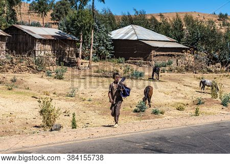 Gondar, Ethiopia - Feb 07, 2020: Ethiopian People On The Road From Gondar To The Simien Mountains, N