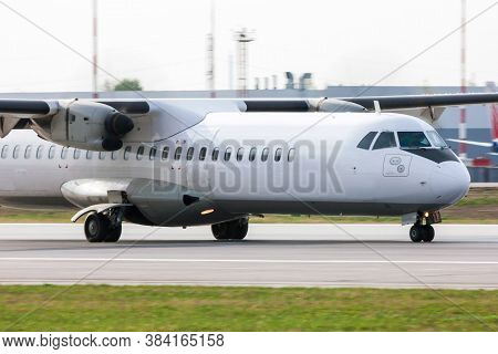 Close Up Of A Taxiing Turboprop Aircraft