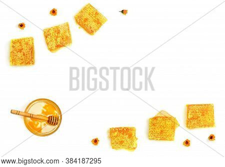 Honey In Glass Bowl, Wooden Honey Dipper, Honeycombs With Honey And Orange Flowers On A White Backgr