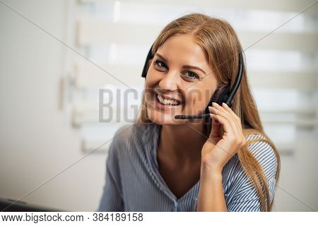 Young Modern Woman Is Working From Home. Online Operator Working At Home.