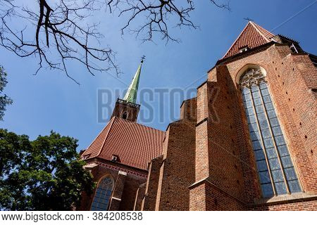 Towers Of Collegiate Church Of The Holy Cross And St. Bartholomew In Wroclaw, Poland, Eu