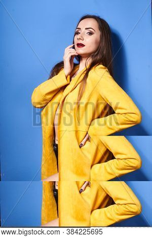 The Girl In The Yellow Coat Is Posing