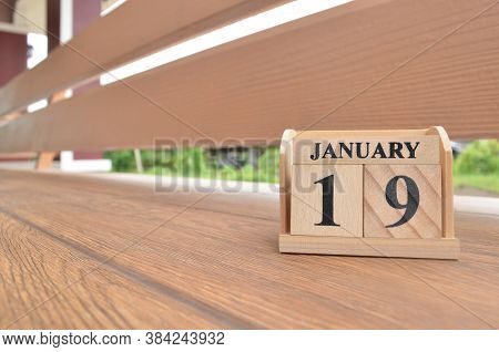 January 19, Number Cube With Wooden Balcony Background.