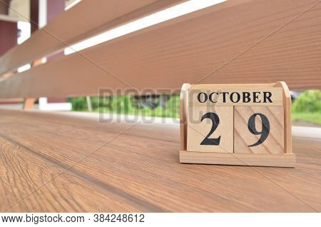 October 29, Number Cube With Wooden Balcony Background.