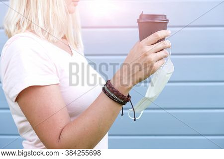 Hippie Woman Wearing Boho Leather Wrist Bracelets Holding Takeaway Paper Cup Of Coffee And Protectiv