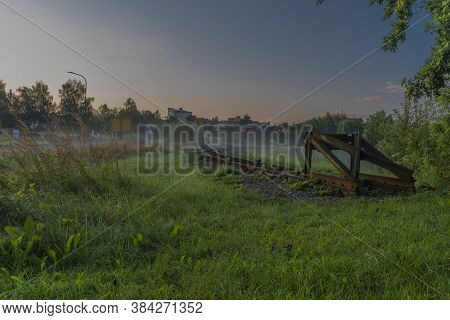 Narrow Gauge Railway Near Gmund Station In North Austria With Mist And Sunrise