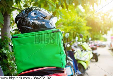 Grabfood, A Green Bag And A Helmet On A Food Delivery Man's Motorcycle: Online Food Ordering Ideas