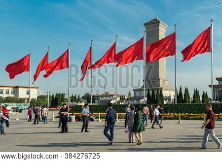 Beijing / China - September 27, 2014: Red Banners Unfurled In The Wind At Tiananmen Square Ahead Of 