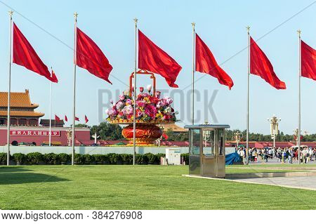 Beijing / China - September 27, 2014: Red Banners Unfurled In The Wind At Tiananmen Square Ahead Of 