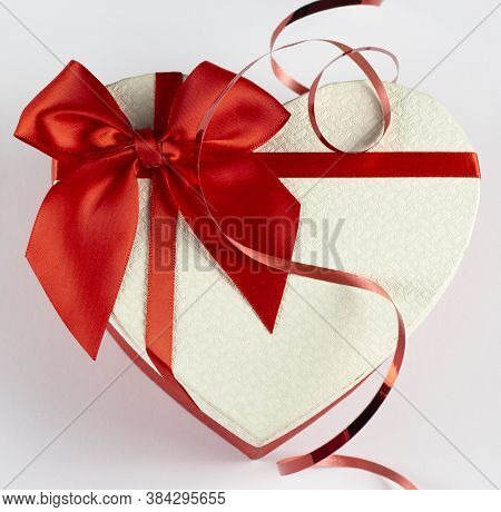 Valentine's Day Concept Valentine's Day. Red Rose With Petals On A White Background. Valentine's Car