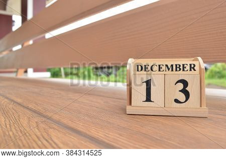 December 13, Number Cube With Wooden Balcony Background.